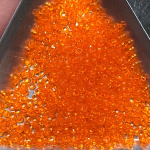11/0 Japanese Seed Beads - Transparent Orange Miyuki # 138 (5&quot; round tube, about 24 grams)
