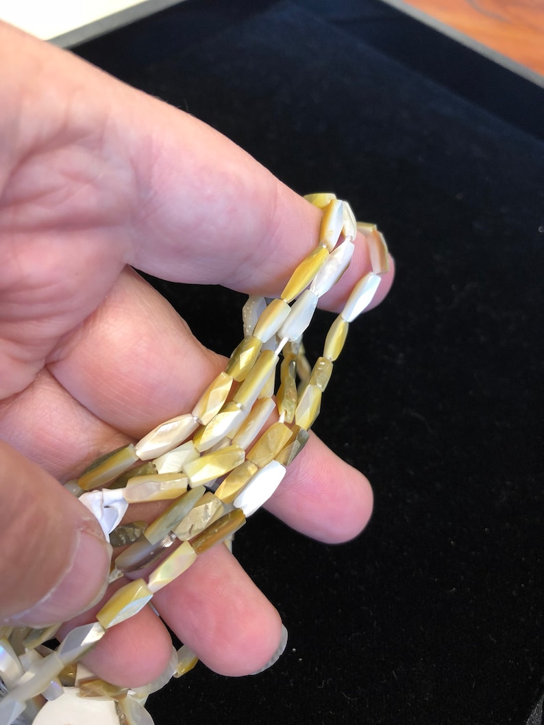 3 strands of Mother of pearl unusual faceted oblong beads Three 16 strands