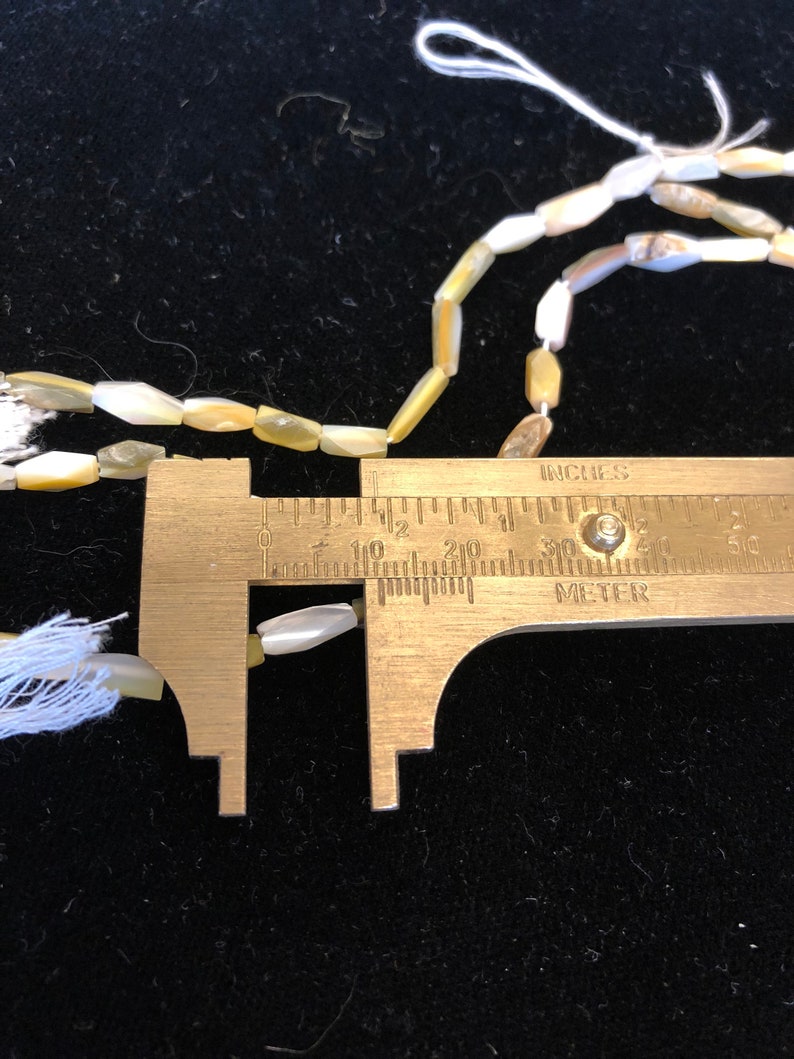 3 strands of Mother of pearl unusual faceted oblong beads Three 16 strands