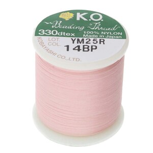 May include: A spool of pink nylon beading thread, labeled "K.O. Beading Thread 330dtex 100% NYLON Made in Japan LOT. COL. YM25R 14BP KOBAYASHI CO., LTD."