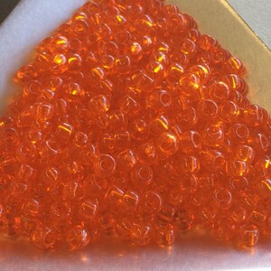 8/0 Japanese Seed Beads - Transparent Orange #138 (about 22 grams)