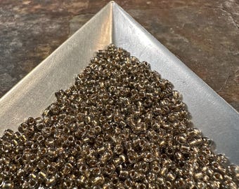 11/0 Japanese Seed Beads - Gold Lined Black Diamond Toho # 993 (5" round tube, 24 grams)