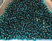11 0 Japanese Seed Beads - Silver Lined Teal Toho 27BD (5 quot round tube, approx 24 grams)