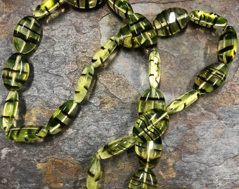 Green Glow, Yellow-Green and Black "Tortoise" 16x11mm Czech Oval Beads Strand of 25, fluorescent under black light Uranium Glass