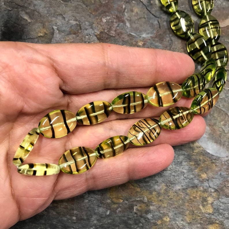 Green Glow, Yellow-Green and Black Tortoise 16x11mm Czech Oval Beads Strand of 25, fluorescent under black light Uranium Glass image 4