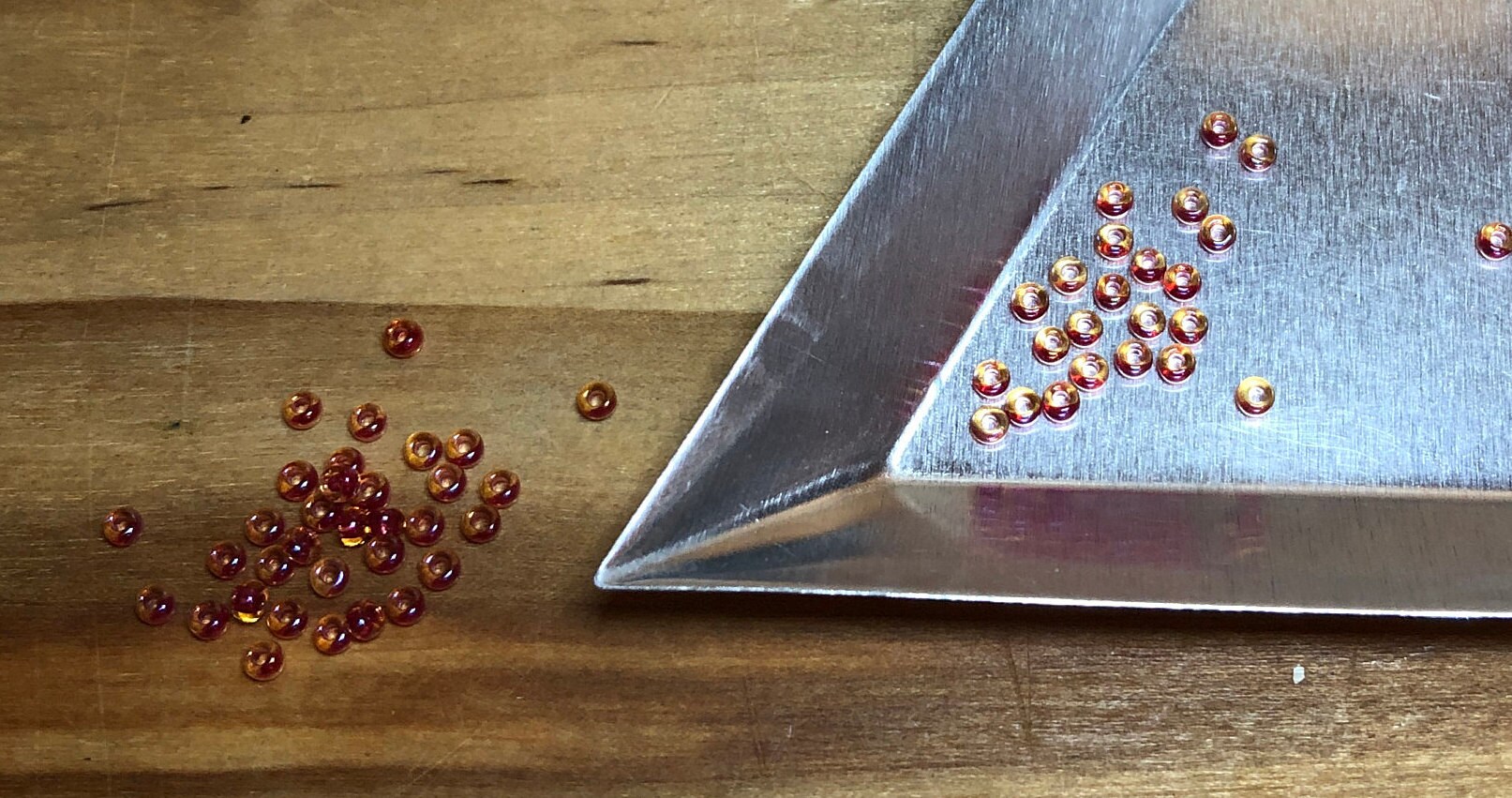 11/0 Japanese Seed Beads - Light Cranberry Lined Topaz Luster
