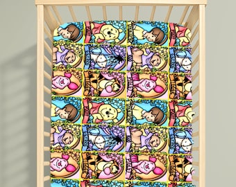 May include: A cot sheet featuring a repeating grid pattern of Winnie the Pooh characters including Pooh, Piglet, Tigger, Eeyore, Roo, and Christopher Robin. Each character is framed in a circular border with floral accents and a name banner.