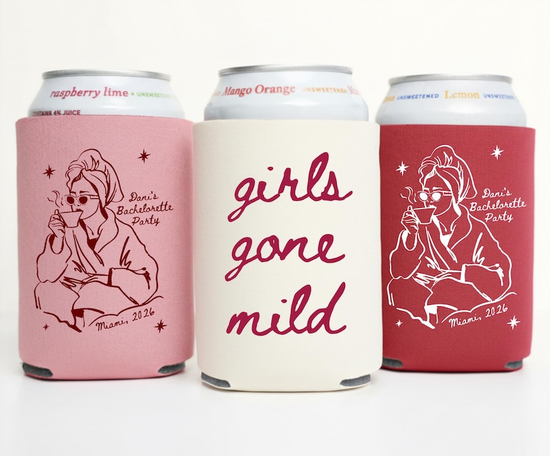 May include: Three beverage can coolers in pink, cream, and red. The pink and red coolers feature a line drawing of a woman in a robe, holding a cup. The cream cooler has the words "girls gone mild" in cursive. All coolers have text that reads "Dani's Bachelorette Party Miami, 2026".