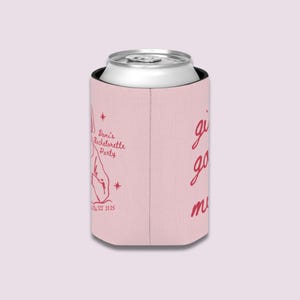 May include: A pink can cooler with a silver can inside. The cooler has red text that says "Dani's Bachelorette Party" and "girls go mad". The date "NY 2025" is also printed on the cooler.