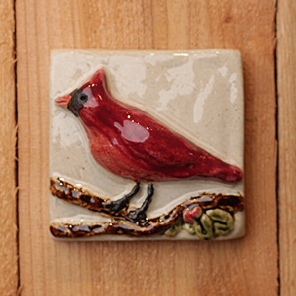 Handmade 4x4 ceramic cardinal tile comes with a hanger on the back
