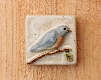 Handmade 2x2 ceramic bluebird tile comes with a hanger on the back