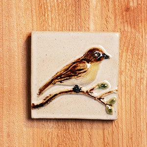 Handmade 3x3 ceramic bird tile comes with a hanger on the back