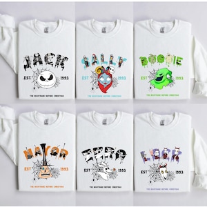 a group of t - shirts with different designs on them