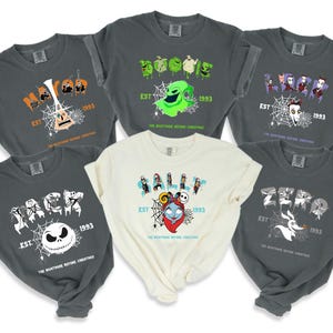 a group of t - shirts with different designs on them