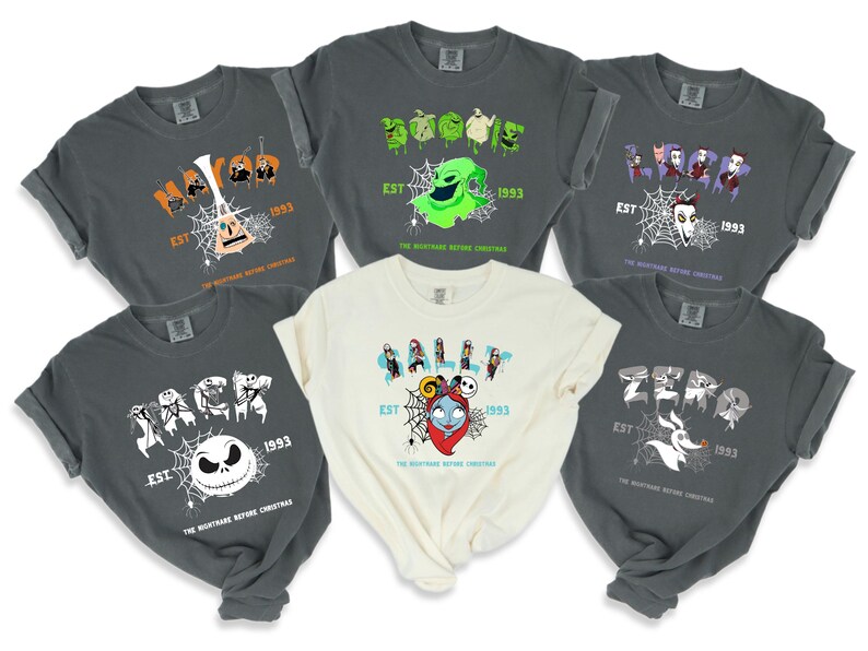 a group of t - shirts with different designs on them