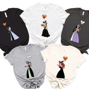 a group of t - shirts with disney characters on them