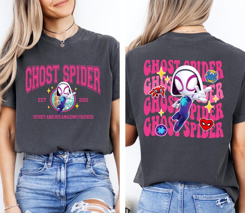 a woman wearing a black t-shirt with a graphic design of a character from the Spider-Man franchise.