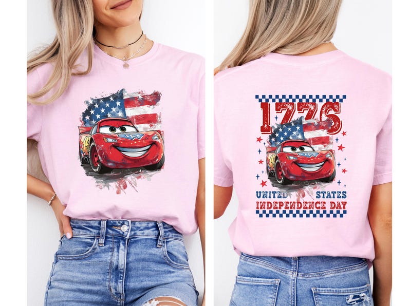 a woman wearing a pink shirt with cars printed on it