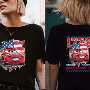 a woman wearing a t - shirt with the american flag on it