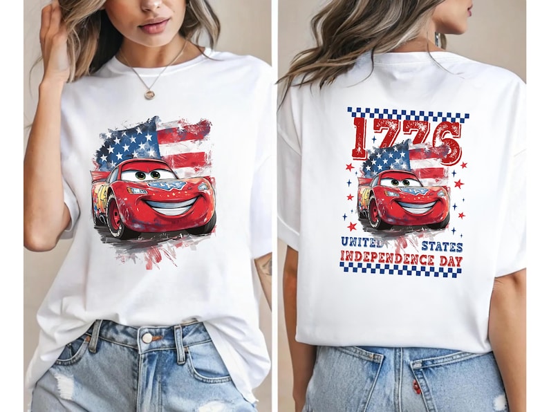 a woman wearing a white t - shirt with cars printed on it