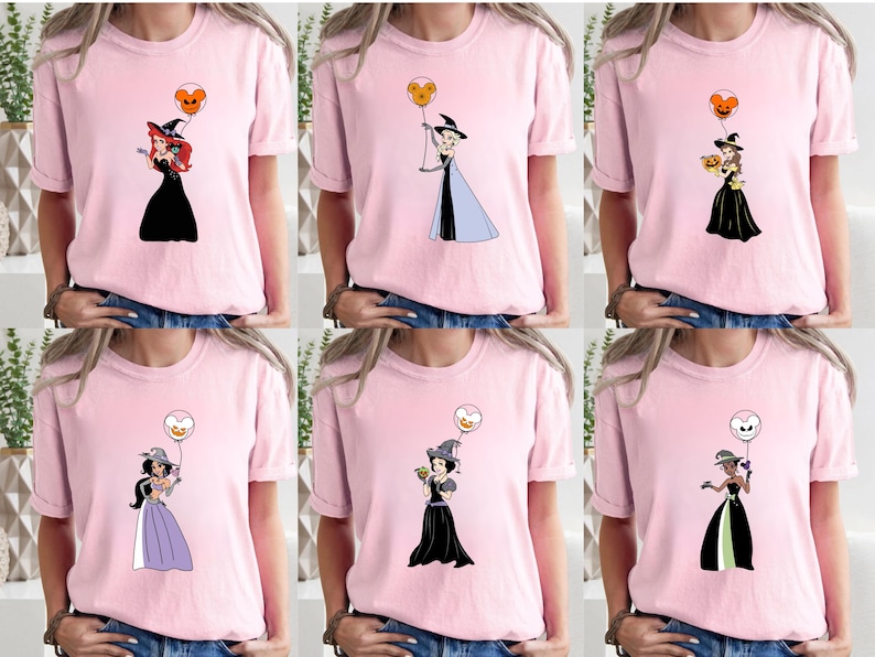 a woman wearing a pink shirt with cartoon characters on it