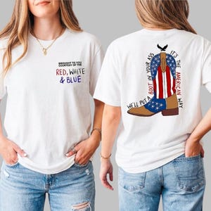 May include: White t-shirt with the text "Brought to you courtesy of the Red, White & Blue" on the front. The back features a graphic of a cowboy boot in red, white, and blue, with the text "It's the American Way."