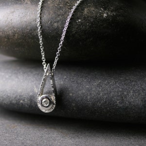 Round diamond flush set with hammered texture sterling silver pendant necklace teardrop pear shape conflict free
