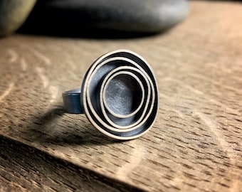 Modern sterling silver ring with oxidized concentric circles, Orbit
