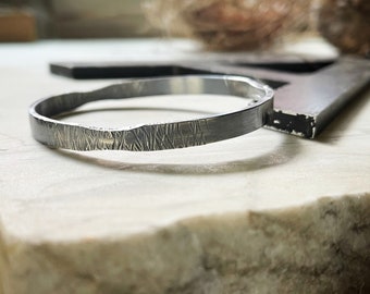 Oxidized sterling silver hammered and forged round bangle bracelet