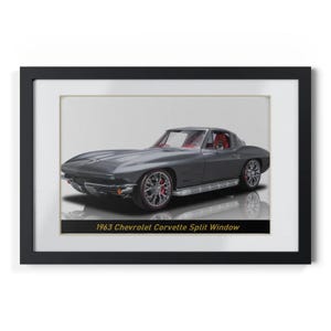 May include: Framed print of a 1963 Chevrolet Corvette Split Window. The classic car is gray with red interior and wheels. The image is set against a white background and framed in black.