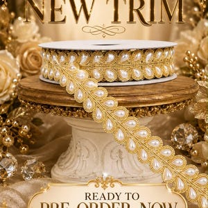 May include: A spool of gold trim featuring a repeating teardrop pattern with white faux pearls set in the center of each loop. The text EXCLUSIVE NEW TRIM is at the top and READY TO PRE-ORDER NOW is at the bottom of the image.