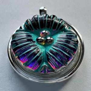 Spectacular Sea Green and Dark Blue Flower with Silver Accents Set in Round Silver Pendant with attached Silver Bail #2444