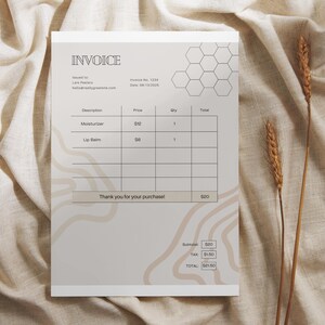 May include: A beige invoice with a honeycomb pattern at the top. The invoice lists two items: Moisturizer for $12 and Lip Balm for $8. The total is $21.50.