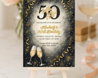 May include: A 50th birthday invitation card on a small wooden easel. The card features a black and gold design with the text "Hello Fifty!" and details for the event, including the name "Kimberly's", date, time, and RSVP information. Two champagne glasses are at the bottom.