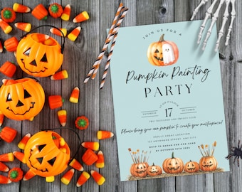 May include: A blue invitation card with a watercolor illustration of a pumpkin with a ghost face. The text on the card reads "Join us for a Pumpkin Painting Party" and includes the date and time of the event. The card is surrounded by candy corn and jack-o-lantern buckets.