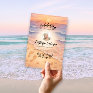 May include: A memorial card with a beach scene background, featuring a sunset, ocean waves, and footprints in the sand. The card reads "Celebrating the Life of Kathryn Johnson" with dates and location details.