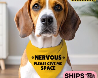 May include: A yellow dog bandana with black paw prints and the text "NERVOUS PLEASE GIVE ME SPACE".
