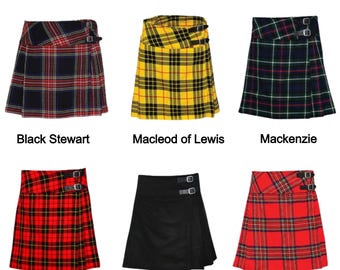 May include: Six different mini kilts in various tartan patterns, including black, red, yellow, and green. The kilts are all 20 inches long and have a simple design with two buckles on the side.