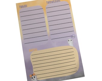 May include: A rectangular daily planner notepad with a purple and orange gradient background. It features sections labeled TODAY, TOMORROW, and NOTES with black horizontal lines. Two small white ghost illustrations are present, one with an orange bow and one with a speech bubble saying Boo.