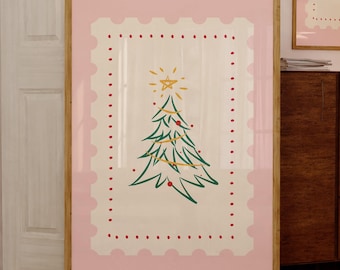 May include: Three framed Christmas prints. The largest shows a green Christmas tree with a star, within a pink border. Two smaller prints display a wreath and the text "Have a holly jolly Christmas" in red.