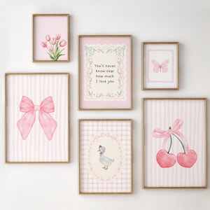 May include: A set of framed art prints in a pastel pink and gold color scheme. The prints depict a pink bow, cherries, a butterfly, tulips, and a duck. One print includes the text "You'll never know dear how much I love you."