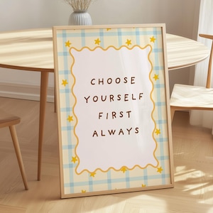 Colorful preppy gallery wall set with motivational quote prints, pastel florals, bows, striped patterns, and playful dopamine decor artwork displayed in gold frames on a neutral wall.