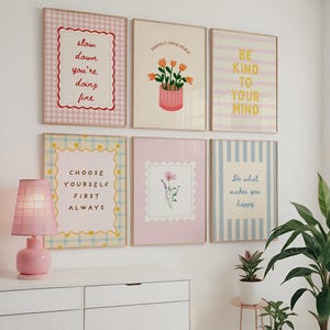 Colorful preppy gallery wall set with motivational quote prints, pastel florals, bows, striped patterns, and playful dopamine decor artwork displayed in gold frames on a neutral wall.