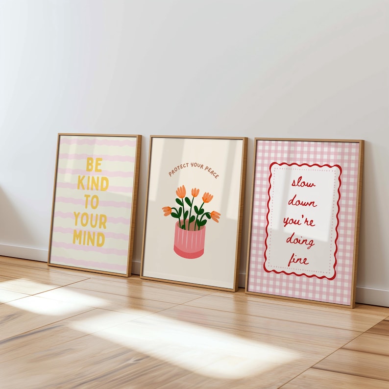 Colorful preppy gallery wall set with motivational quote prints, pastel florals, bows, striped patterns, and playful dopamine decor artwork displayed in gold frames on a neutral wall.