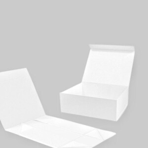 May include: White, foldable gift boxes. One box is open, revealing the interior, while another is partially open, and the third is flat. The boxes are made of a textured material and are set against a light gray background.