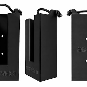 May include: Three views of a black rectangular object with a handle and a slot. The object has the text "SHOREWRIGHT" and "SPEARO-1" embossed on it. It has two holes and a black cord attached to the top.