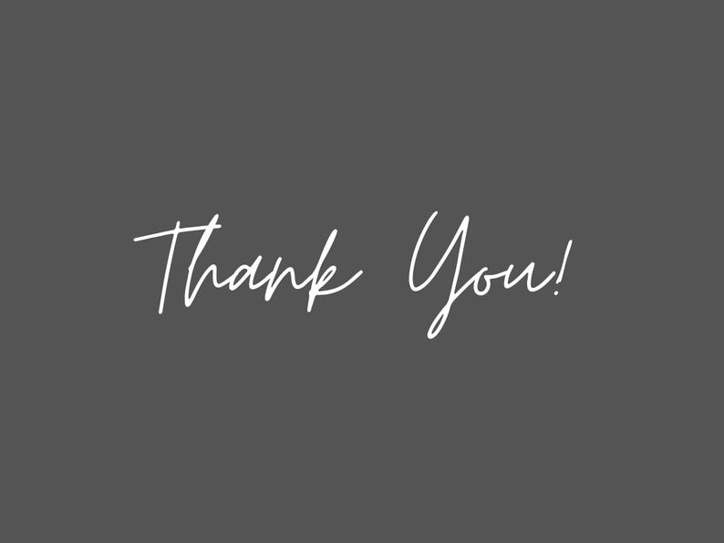 May include: A simple white handwritten message on a gray background that says "Thank You!"