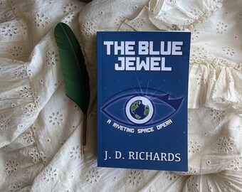 The Blue Jewel: A Riveting Space Opera by J. D. Richards and designed by Corina Richards