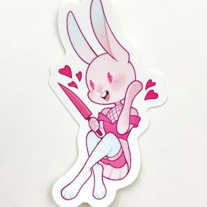 Niedlicher Hase mit Messer und Herzen Sticker