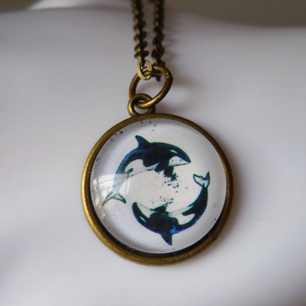 Orca whale necklace. Orca whale pendant. Orca necklace. Bronze glass cabochon. Killer whale jewelry. Antique brass metal. Black and white.